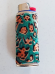 Bic METAL AND FABRIC LEAPARD PATTERN CAS WITH LARGE BIC LIGHTER COLLECTABLE