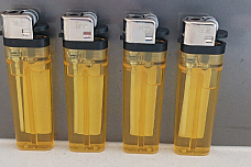 4 X  large MRK Cigarette Lighters Disposable adjustable flame yellow transparent