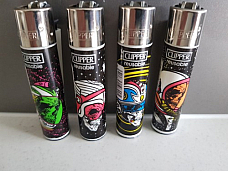 Clipper  4 Skull Helmets Refillable Lighters  collectable set of 4+ bonus