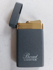 Zico/Broad  jet  lighter gas refillable slimline  grey and gold