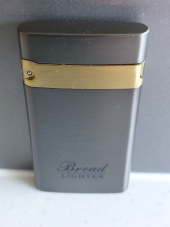 Zico/Broad  jet  lighter gas refillable slimline  grey and gold